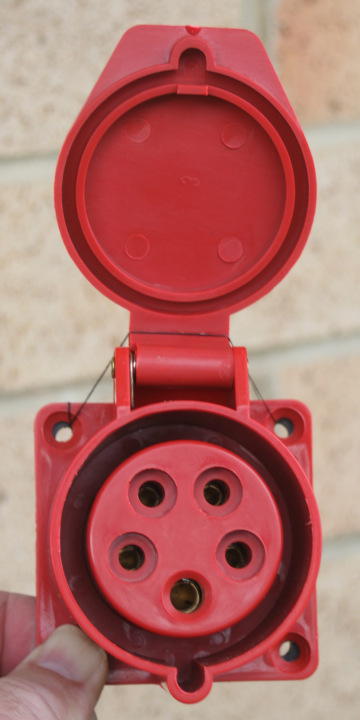 5 hole red 60309 connector, held open by a cotton.